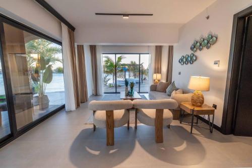 a living room with a couch and a table at Shades Beach Club in Jeddah