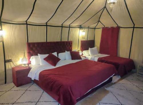 Best Merzouga Sahara Campにあるベッド