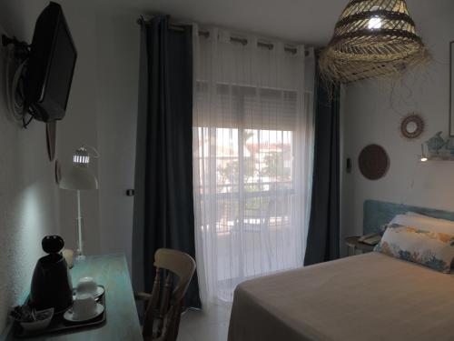 Ένα ή περισσότερα κρεβάτια σε δωμάτιο στο LOS NAREJOS Hotel