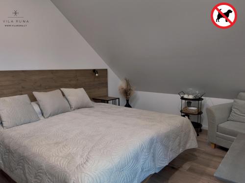Postel nebo postele na pokoji v ubytování Vila RUNA