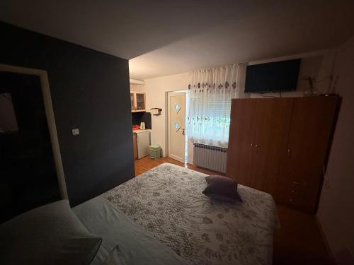 Postel nebo postele na pokoji v ubytování Ivica House