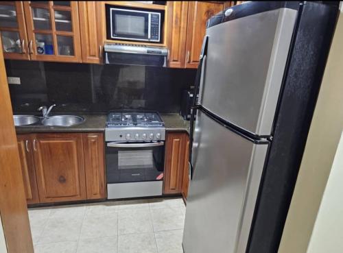 Кухня или мини-кухня в Apartamento en Lecheria, Venecia
