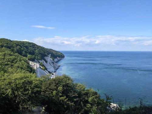 a view of the ocean from a cliff at 6 person holiday home in Borre in Borre