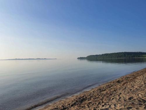 a view of the shore of a body of water at 8 person holiday home in Haderslev in Haderslev