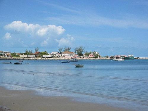 a large body of water with boats in it at Buccaneer Hill Main House home in Governorʼs Harbour