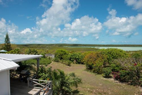 a view of the ocean from the deck of a house at Utopia House home in Savannah Sound
