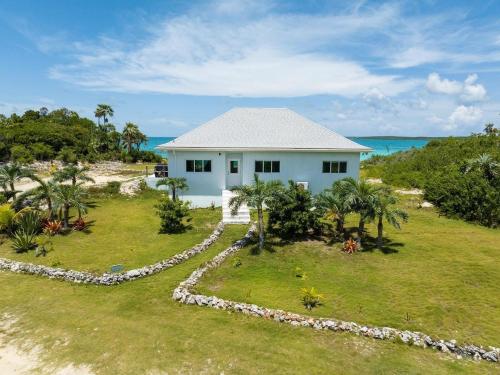 an aerial view of a house on the beach at Bella Mer home in Savannah Sound