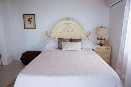 Ένα ή περισσότερα κρεβάτια σε δωμάτιο στο Blue Love Point home