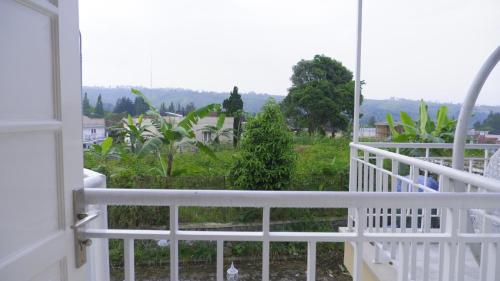 Μπαλκόνι ή βεράντα στο Diyar Villas Puncak H8/7