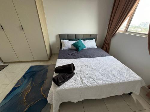 Postel nebo postele na pokoji v ubytování Seri Topaz staycation Puchong