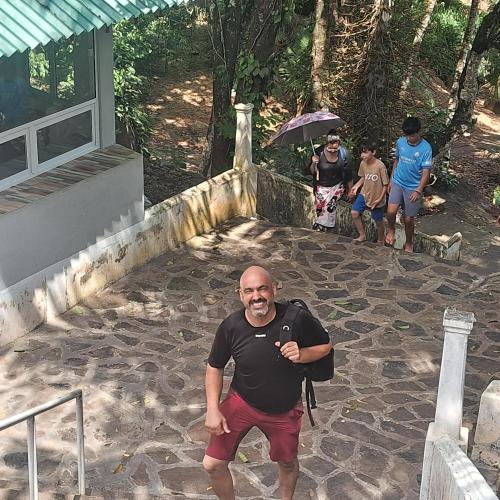 a man is standing on a stone floor at RKO Villa27 - Unawatuna in Habaraduwa