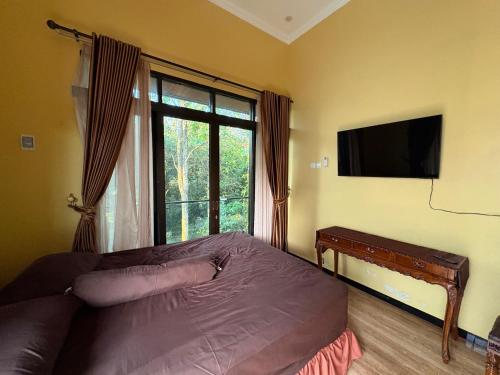 Μια τηλεόραση ή/και κέντρο ψυχαγωγίας στο Kreo Guest House