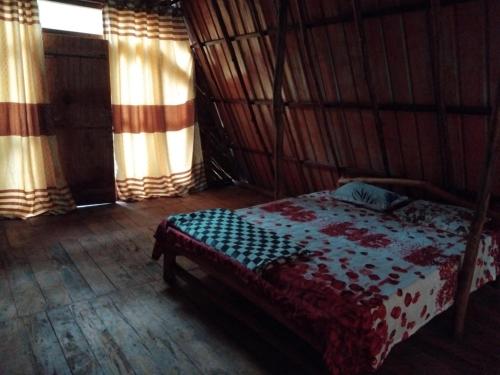 Postel nebo postele na pokoji v ubytování Ella Rock Lodge