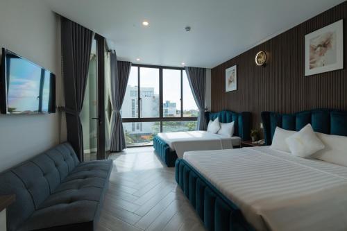 Cama o camas de una habitación en Tuấn Ninh Hotel II