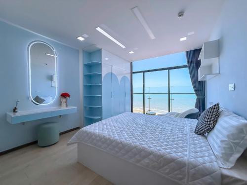 Postel nebo postele na pokoji v ubytování CSJ Tower Vung Tau