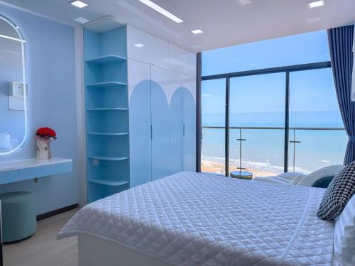 Postel nebo postele na pokoji v ubytování CSJ Tower Vung Tau