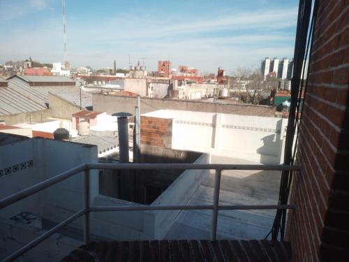 a view of a city from a balcony at Todo cerca en la ciudad in Buenos Aires
