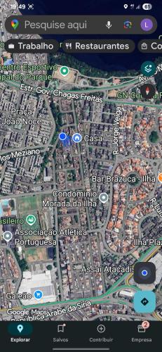 a map of a city on a cell phone at Quarto Privado Cama Casal e Individuais Apto in Rio de Janeiro