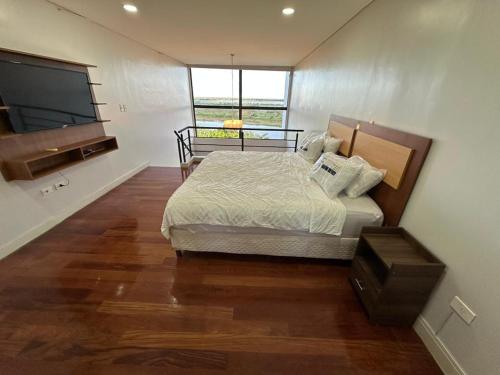 Ein Bett oder Betten in einem Zimmer der Unterkunft Luxurious apartment in Macondo
