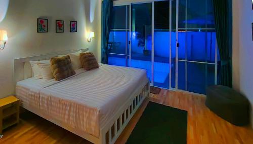 Ένα ή περισσότερα κρεβάτια σε δωμάτιο στο 3 Bed Villa Private Pool South Pattaya