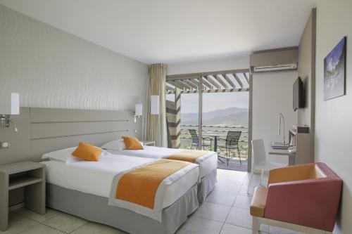 En eller flere senge i et værelse på Best Western Plus San Damianu