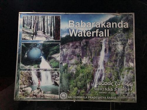 a magazine with a picture of a waterfall at e34 Café, Restaurant & Hotel Koslanda Hideaway with a Private Natural Pool in Koslanda