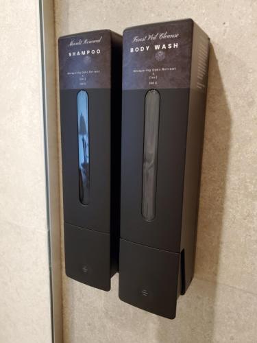 two black boxes are sitting next to each other at The Whispering Oaks Retreat in Vahagnadzor