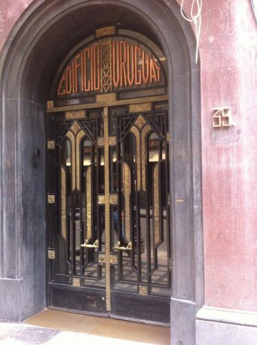 an entrance to a store with a wrought iron door at Beautiful, down-town in Mexico City