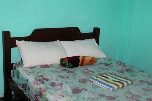 Ein Bett oder Betten in einem Zimmer der Unterkunft OYO Hotel Tbs