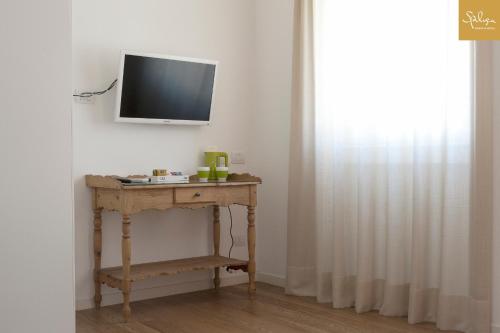 Spluga Sosta & Hotelにあるテレビまたはエンターテインメントセンター