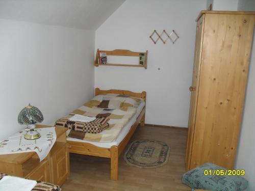 Postel nebo postele na pokoji v ubytování Penzión u Peťa