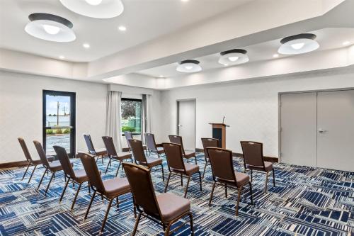 a conference room with chairs and a podium at Hampton Inn Laramie in Laramie