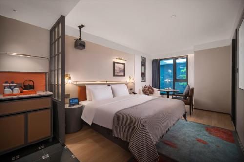 Postel nebo postele na pokoji v ubytování CityNote