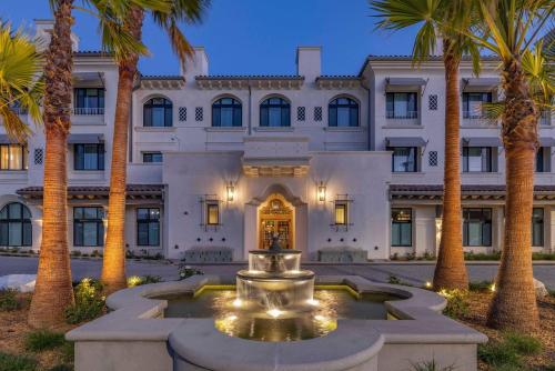 a hotel with a fountain in front of a building at Cambria Hotel Calabasas - Malibu in Calabasas