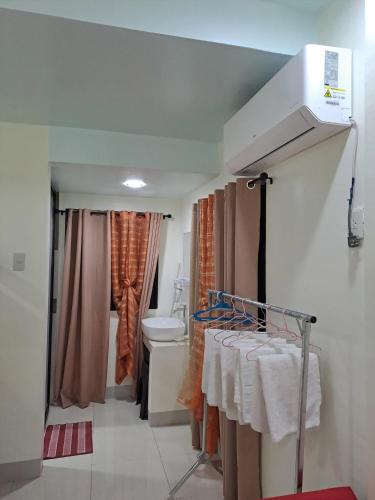 Ένα ή περισσότερα κρεβάτια σε δωμάτιο στο Dalinda's Homestay