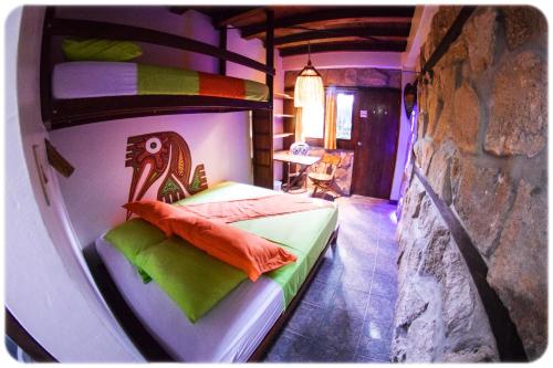 Postel nebo postele na pokoji v ubytování Hostal Oloncito