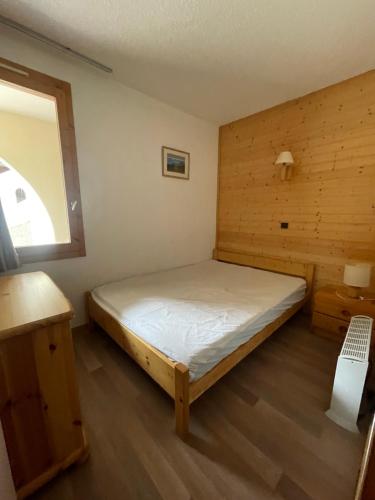 Postel nebo postele na pokoji v ubytování Le petit orgentil