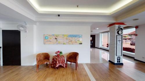 Χώρος καθιστικού στο Golden Hotel
