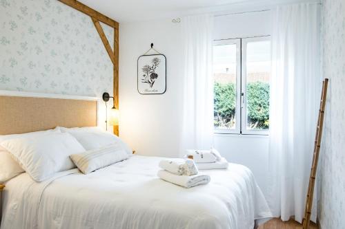 Ένα ή περισσότερα κρεβάτια σε δωμάτιο στο Casa rural Miel y Canela