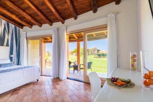 Postel nebo postele na pokoji v ubytování Janna e Sole Resort