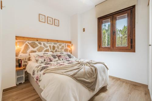 Ένα ή περισσότερα κρεβάτια σε δωμάτιο στο Apartamento El Santo