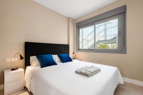 Ένα ή περισσότερα κρεβάτια σε δωμάτιο στο Baviera Hills 1a
