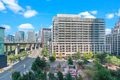 a view of a city with a tall building at Charming Studio in Downtown Toronto in Toronto