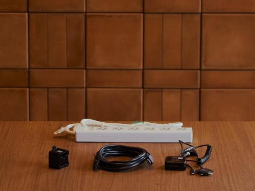 a remote control and a camera on a table at FAV LUX Sapporo Susukino in Sapporo