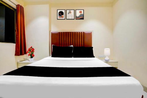 Una cama o camas en una habitación de Hotel O Ulhasnagar Railway Station