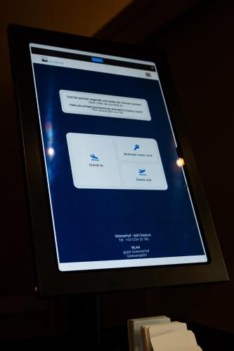 a computer screen with a website on it at Götznerhof - Self-Check-in in Innsbruck