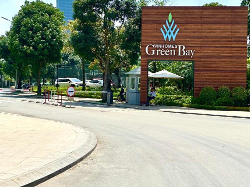 a green bay sign on the side of a street at 5 Star Apt Studio, Swimming Pool, Gyms, Quick To Airport in Hanoi