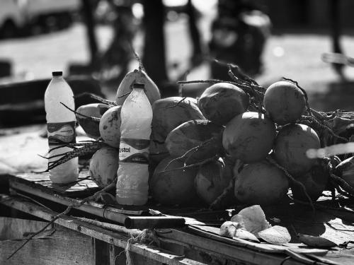 a pile of fruit and bottles on a table at Villa Océan Gravier Rodrigues in Mt Bois Noir