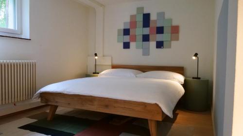Letto o letti in una camera di Hotel Coop Tagungszentrum & Hotelpark im Grünen
