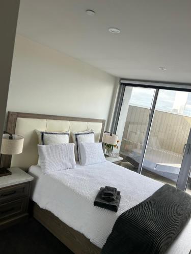 Ένα ή περισσότερα κρεβάτια σε δωμάτιο στο Penthouse with Great City view
